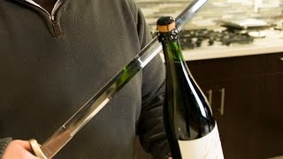 How to open a bottle of champagne with a sword [upl. by Eittik]